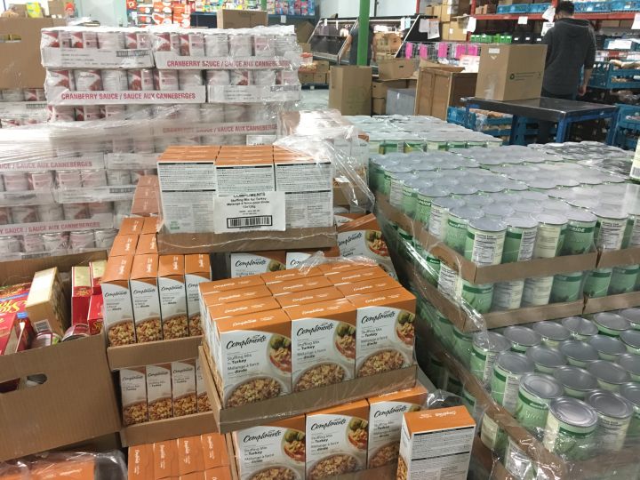 Volunteers are preparing festive hampers for clients of Edmonton’s Food Bank.