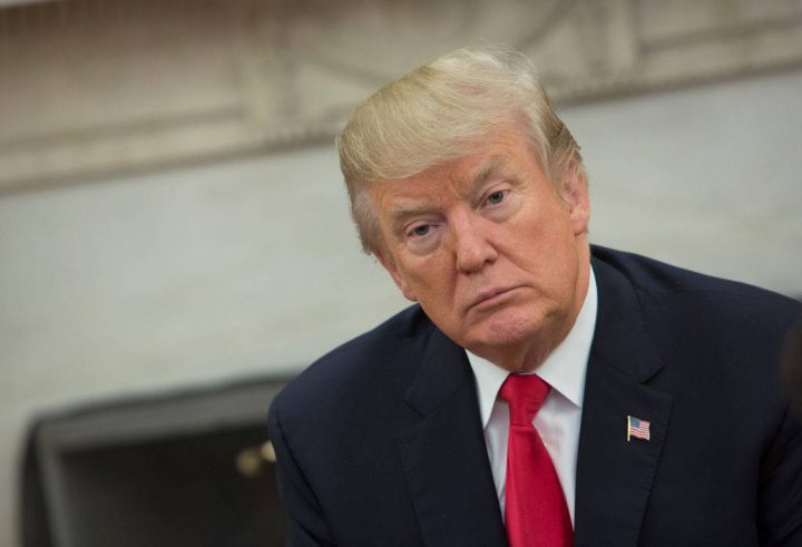 U.S. President Donald Trump meets with business owners and their families to discuss tax reform in the Oval Office of the White House on Dec. 5, 2017 in Washington, DC.