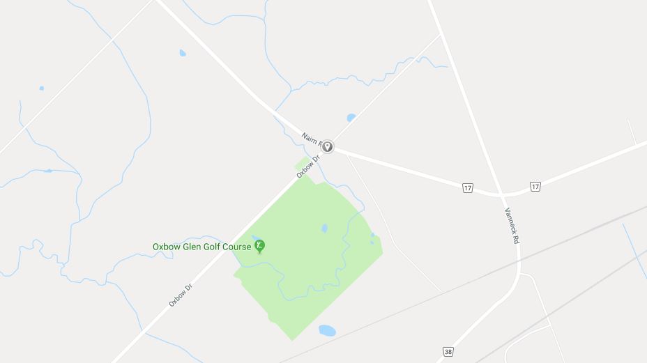 Middlesex OPP say a 25-year-old woman has been charged after a crash Thursday afternoon between a sedan and a school bus.