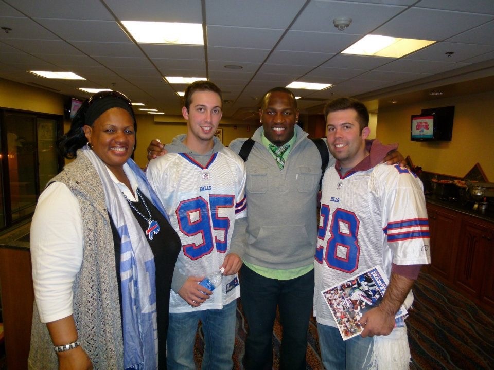 Kent and Kirk Morrison visiting football player Kirk Morrison and his mom.