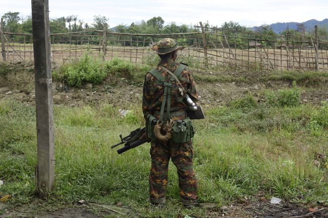 An armed soldier stand guards in Maungdaw township, Rakhine State, western Myanmar, 02 January 2018.