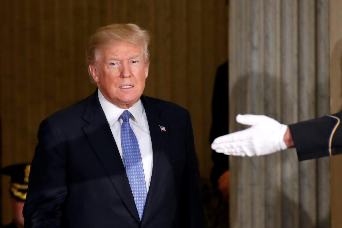 U.S. President Donald Trump arrives for a Congressional Gold Medal ceremony honoring former Senate majority leader Bob Dole (R-KS) on Capitol Hill in Washington, U.S., January 17, 2018.      