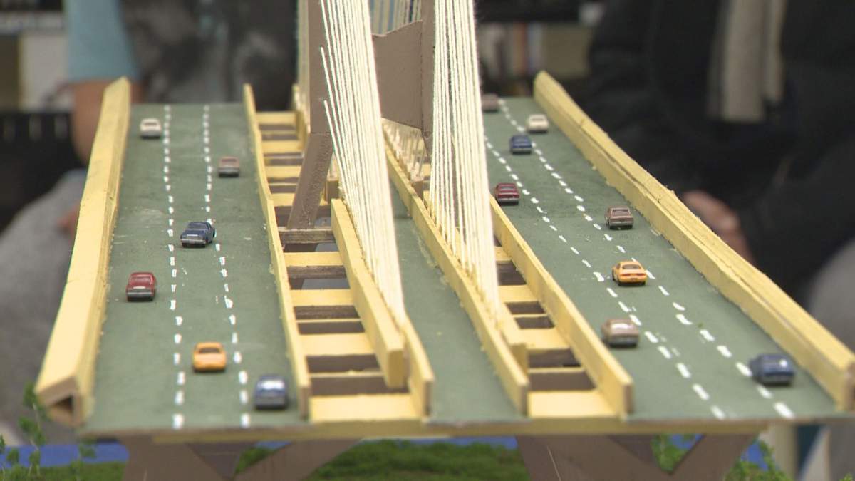 Grade 5 and 6 students of the school’s building club unveiled their model of the Montreal landmark to actual bridge engineers.