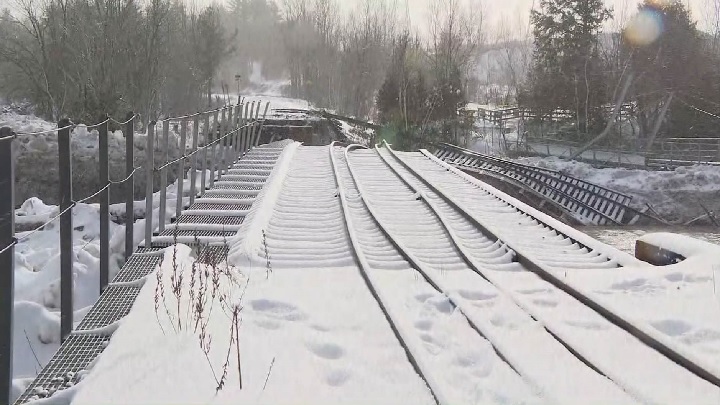 Part of a railway bridge in Sherbrooke, Que. was washed away due to rising water levels. Saturday, Jan. 13, 2018.