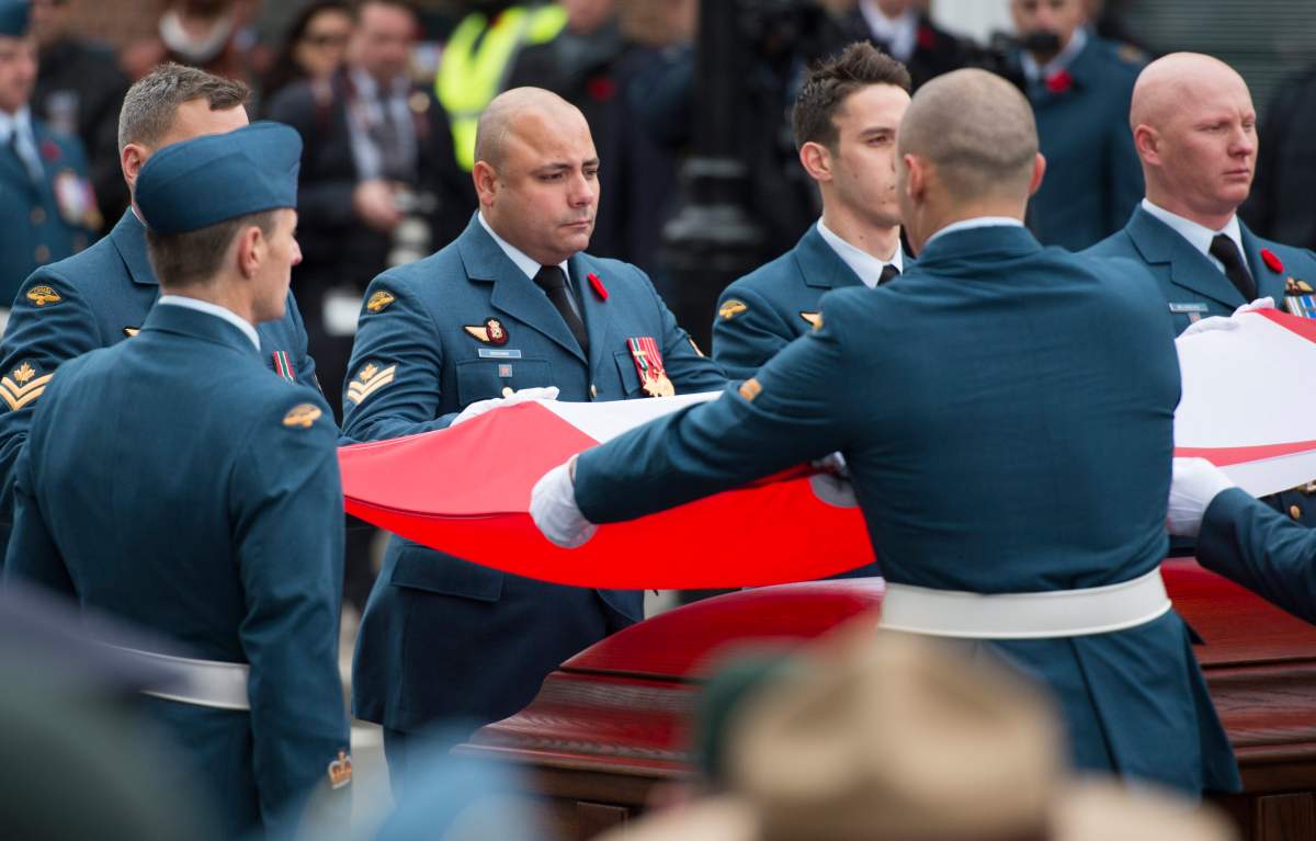 The funeral of Warrant Officer Patrice Vincent, killed in an October 2014 terrorist attack in Quebec. On social media, Othman Hamdan allegedly called Vincent’s killer a “hero.” THE CANADIAN PRESS IMAGES/Graham Hughes