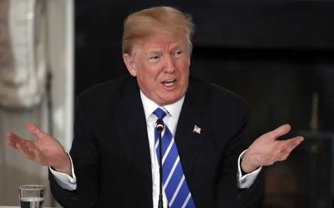 In this Feb. 12, 2018, photo, President Donald Trump speaks during a meeting with state and local officials about infrastructure in the State Dining Room of the White House in Washington. (AP Photo/Carolyn Kaster).