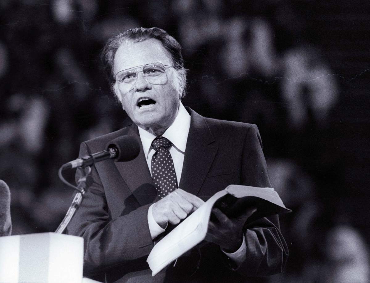 Evangelist Billy Graham, preaches the Gospel to thousands of believers during the meeting at Bercy’s Stadium in Paris as part of a worldwide crusade, September 20, 1986.