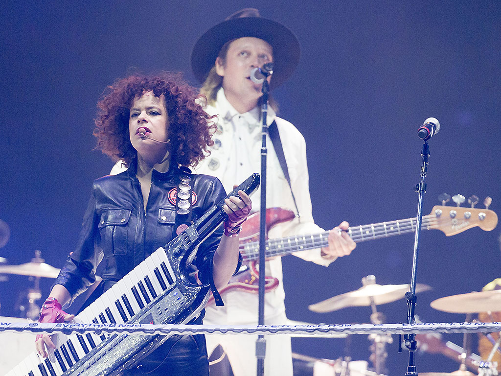Régine Chassagne and Win Butler of Arcade Fire perform at the Air Canada Centre on November 3, 2017.