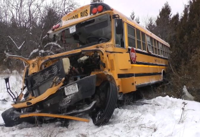 Three people escaped before a train struck a school bus in Colborne, Ont., last February.