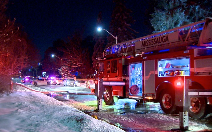 Firefighters battle a house fire in Mississauga on Feb. 8, 2018.