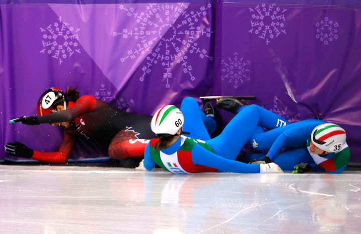 Valerie Maltais of Canada, Cecilia Maffei and Lucia Peretti of Italy fall.
