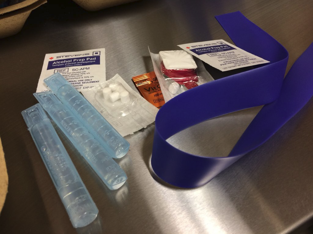 An injection kit which contains a tourniquet, alcohol swabs, a cooker with a filter, extra filters, and sterile water.