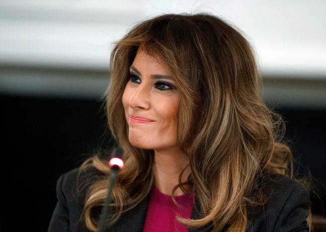In this March 20, 2018 photo, First lady Melania Trump listens during a roundtable on cyberbullying in the State Dining Room of the White House in Washington.