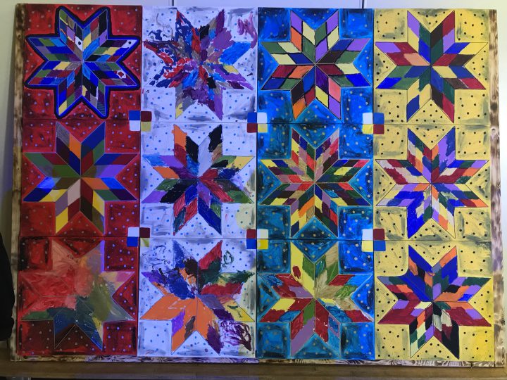 Students at Bishop Klein School presented a blanket mural to the Saskatoon police in a gesture of reconciliation.