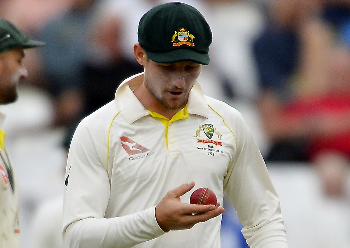 Cameron Bancroft of Australia looks down at the ball during day 3 of the 3rd Sunfoil Test match between South Africa and Australia at PPC Newlands on March 24, 2018 in Cape Town, South Africa.