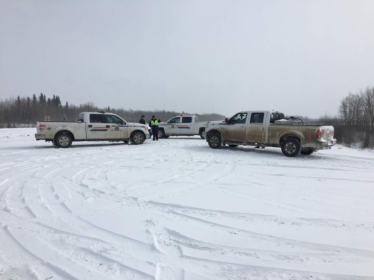 RCMP on scene at Highway 16 and Highway 22 near Evansburg and Entwistle, Alta, where a fatal shootout involving several Mounties and a Calgary murder suspect happened Thursday night. Photo taken Friday, March 30, 2018.