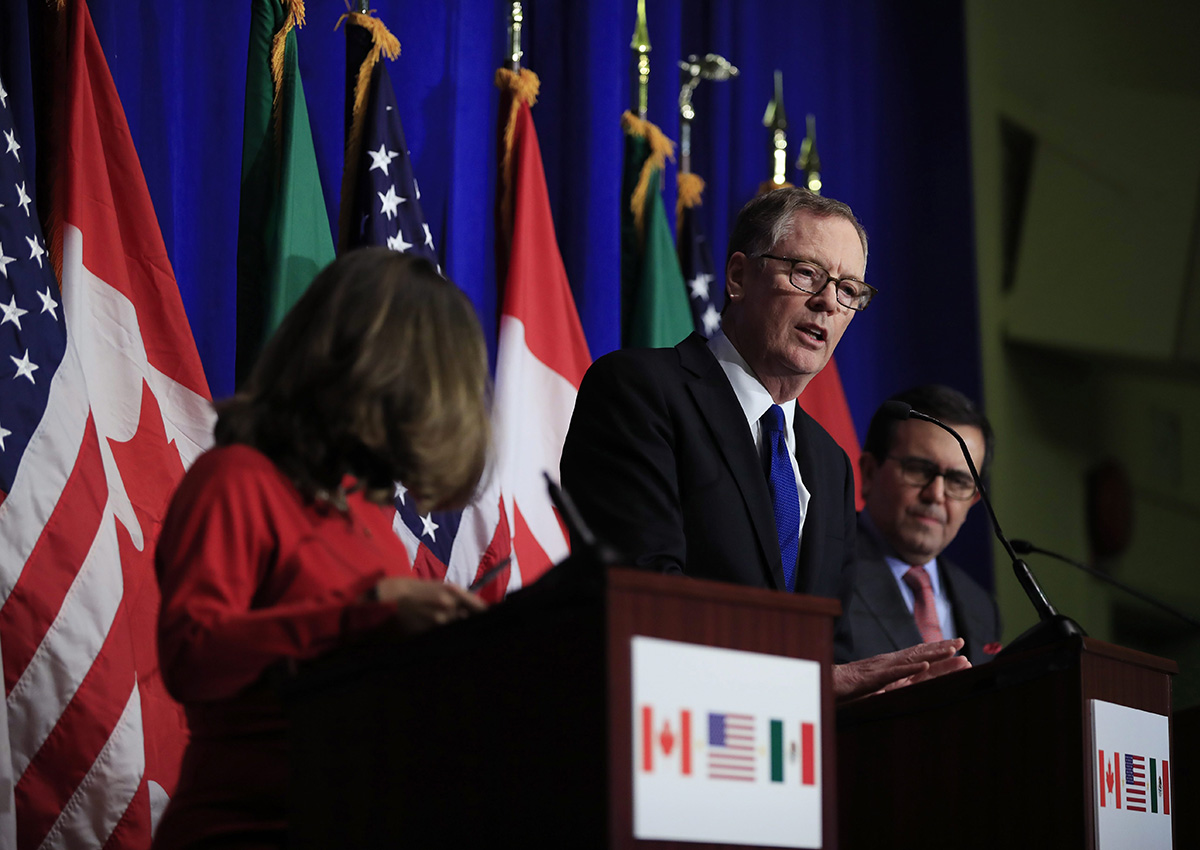 In this Oct. 17, 2017, file photo, U.S. Trade Representative Robert Lighthizer, centre, speaks during the conclusion of the fourth round of negotiations for a new North American Free Trade Agreement (NAFTA) in Washington.