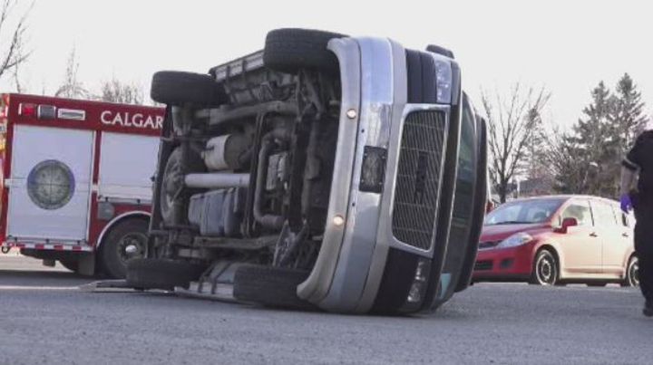 Crews on scene at a rollover on 16 Avenue N.W. Friday.