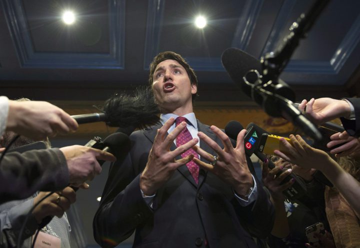 Prime Minister Justin Trudeau responds to reporters questions after speaking at the GBC Resource Efficiency Workshop B7, as part of the G7 meeting, April 5 in Quebec City. 