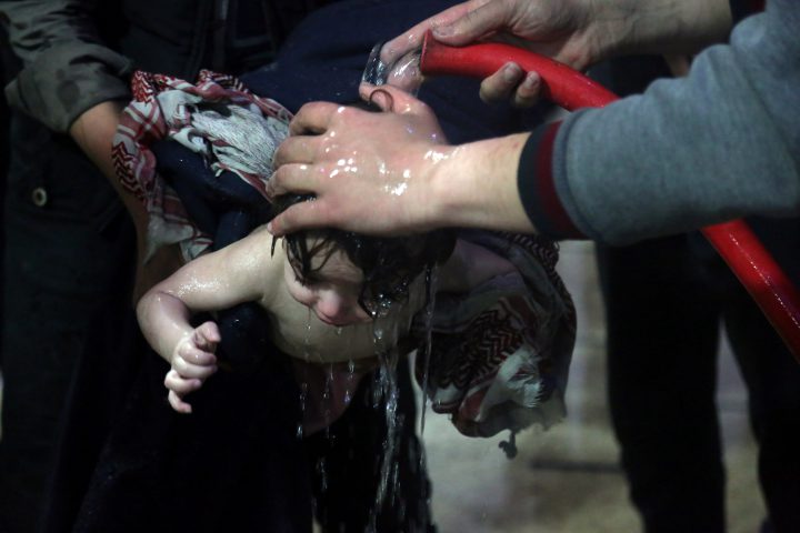 Child treated at a hospital in Ghouta after what a Syria medical relief group claims was a chemical attack.