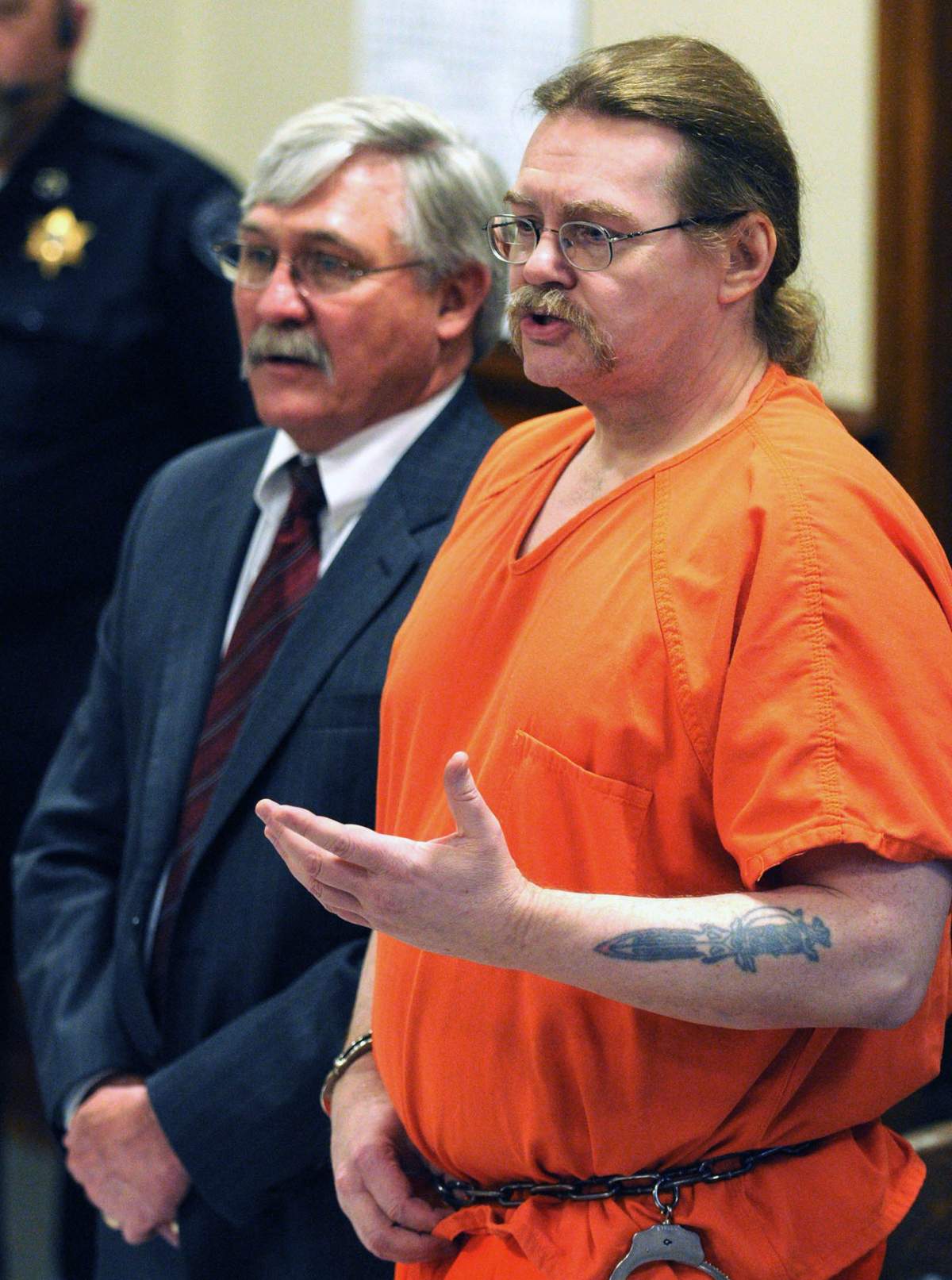 FILE – In this May 2, 2012 file photo, Ronald Smith address the families and friends of Thomas Running Rabbit Jr. and Harvey Mad Man during his clemency hearing in Powell County District court in Deer Lodge, Mont.