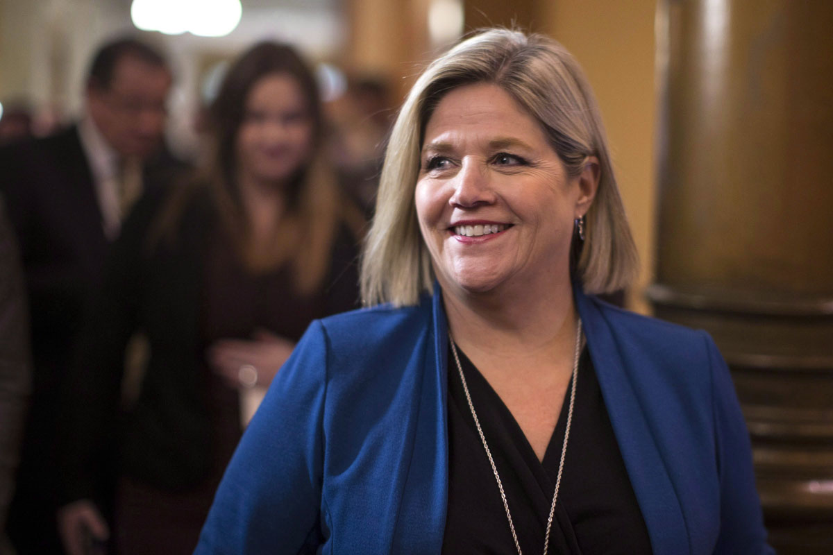 Ontario NDP Leader Andrea Horwath scrums with reporters after the Throne Speech at the Ontario Legislature in Toronto on March 19.