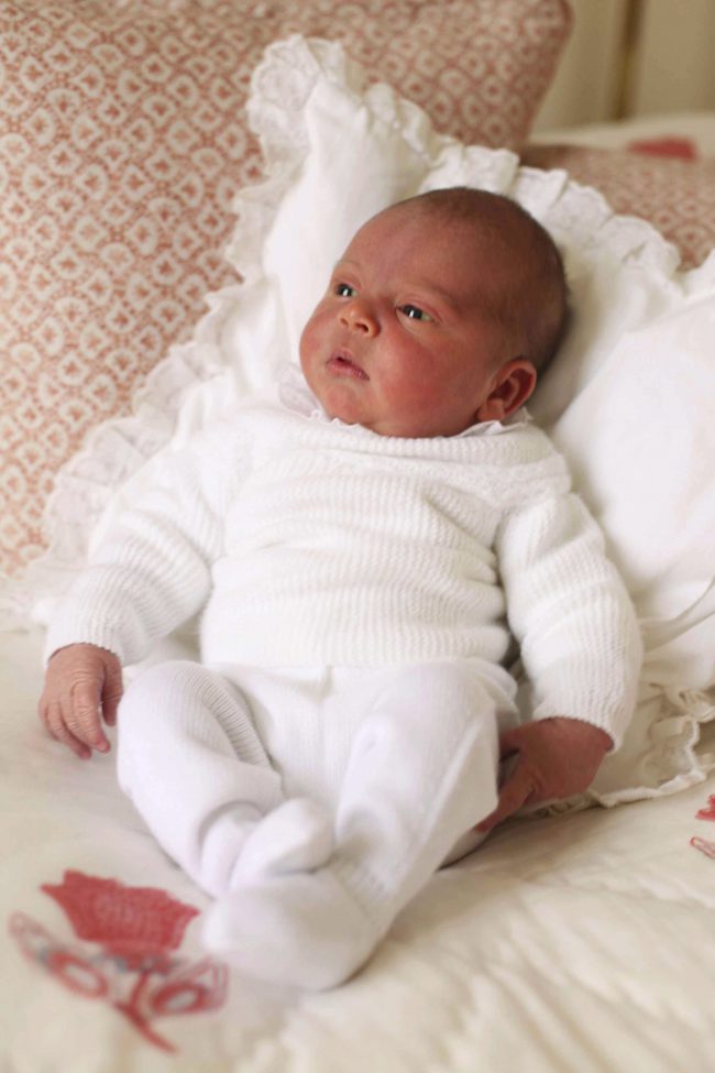 This April 26, 2018 photograph shows Britain’s Prince Louis at Kensington Palace in London.