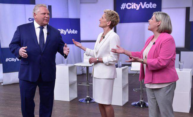 Liberal Premier Kathleen Wynne, Progressive Conservative Leader Doug Ford and NDP Leader Andrea Horwath take part in the Ontario Leaders debate in Toronto, May 7, 2018. 