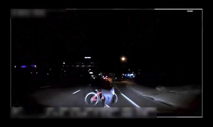 This file image made from video March 18, 2018, of a mounted camera provided by the Tempe Police Department shows an exterior view moments before an Uber SUV hit a woman in Tempe, Ariz.