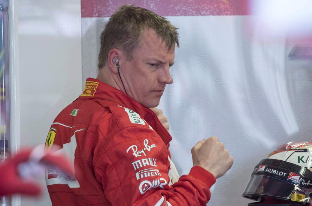 Ferrari driver Kimi Raikkonen of Finland removes his head gear following the third practice session at the Canadian Grand Prix Saturday, June 10, 2017 in Montreal. F1 star Raikkonen has filed a complaint with Montreal police alleging extortion and harassment against a woman who is claiming damages for alleged sexual assault at a Montreal bar in 2016.