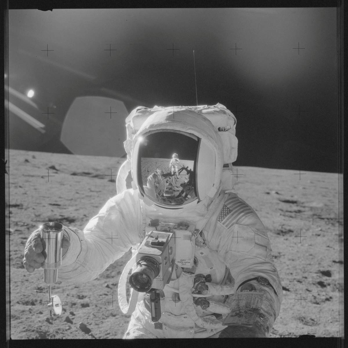 Astronaut Alan L. Bean holds a Special Environmental Sample Container filled with lunar soil collected during the Apollo 12 mission in this NASA handout photo provided November 19, 1969. 