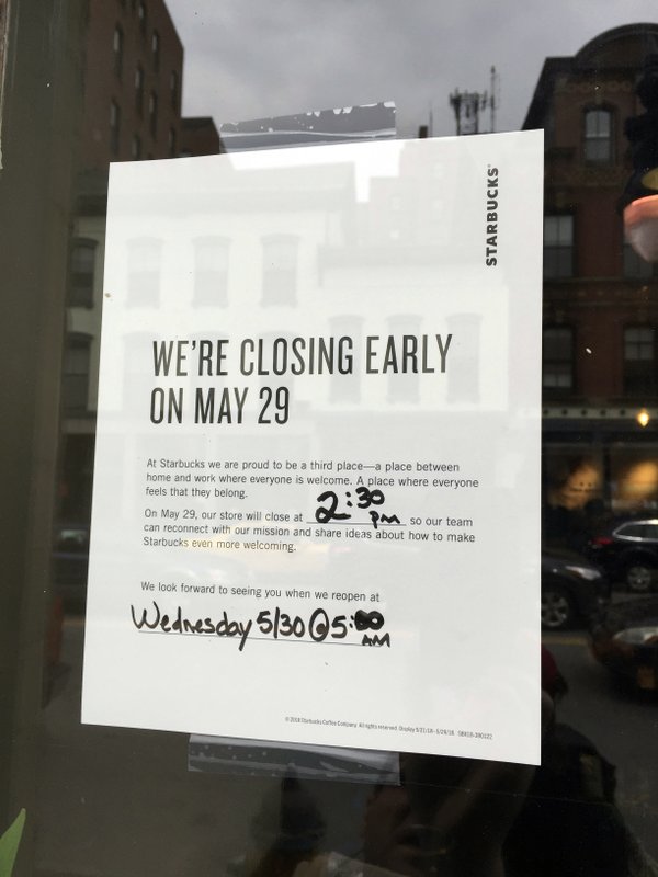 A sign displayed at a Starbucks cafe in Portland, Maine, reminding customers that the store will be closed Tuesday for training.
