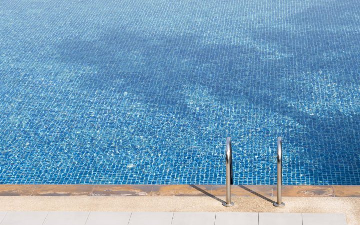 The edge of a swimming pool.