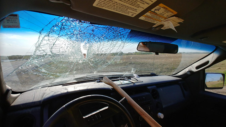 A driver on Highway 16 near Plunkett, Sask., was injured after an axe came through his windshield.