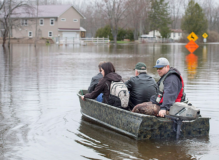 Residents are ferried home at Darlings Island, N.B. on Thursday, May 3, 2018 as the Kennebecasis River flooded the only road into the community.