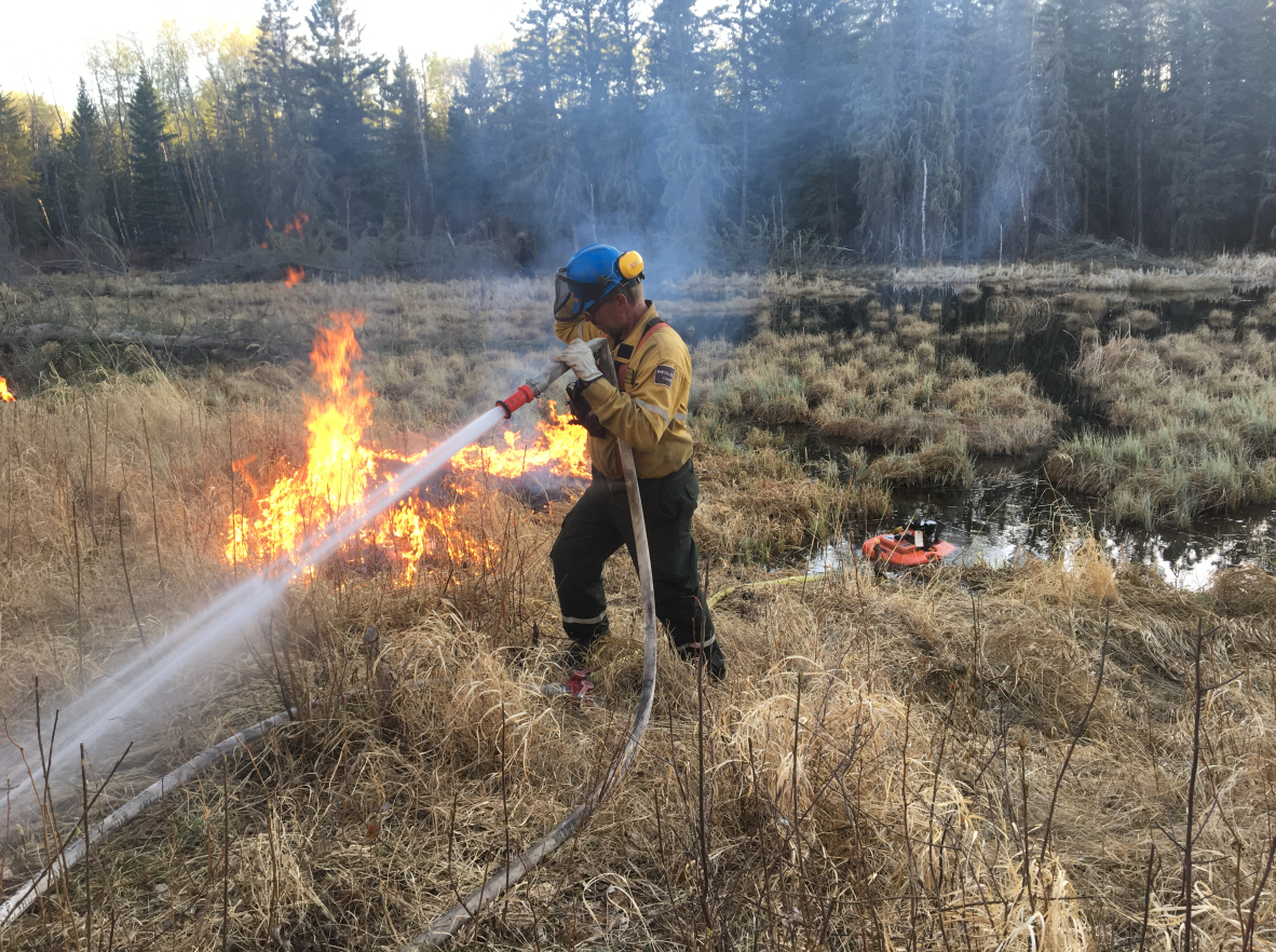 Officials say a wildfire in Prince Albert National Park began as a prescribed burn. 