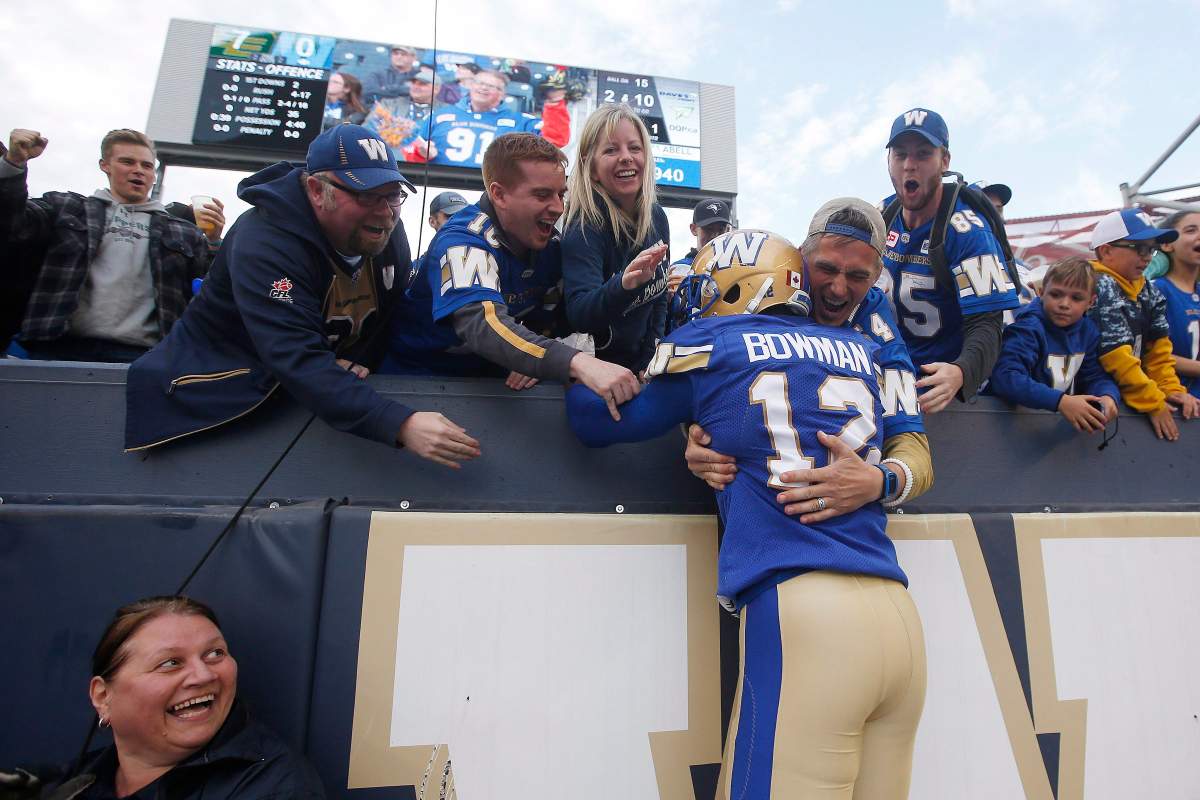Winnipeg Blue Bombers' Adarius Bowman (12) celebrates his touchdown with fans during the first half of pre-season CFL action against the Edmonton Eskimos in Winnipeg Friday, June 1, 2018.