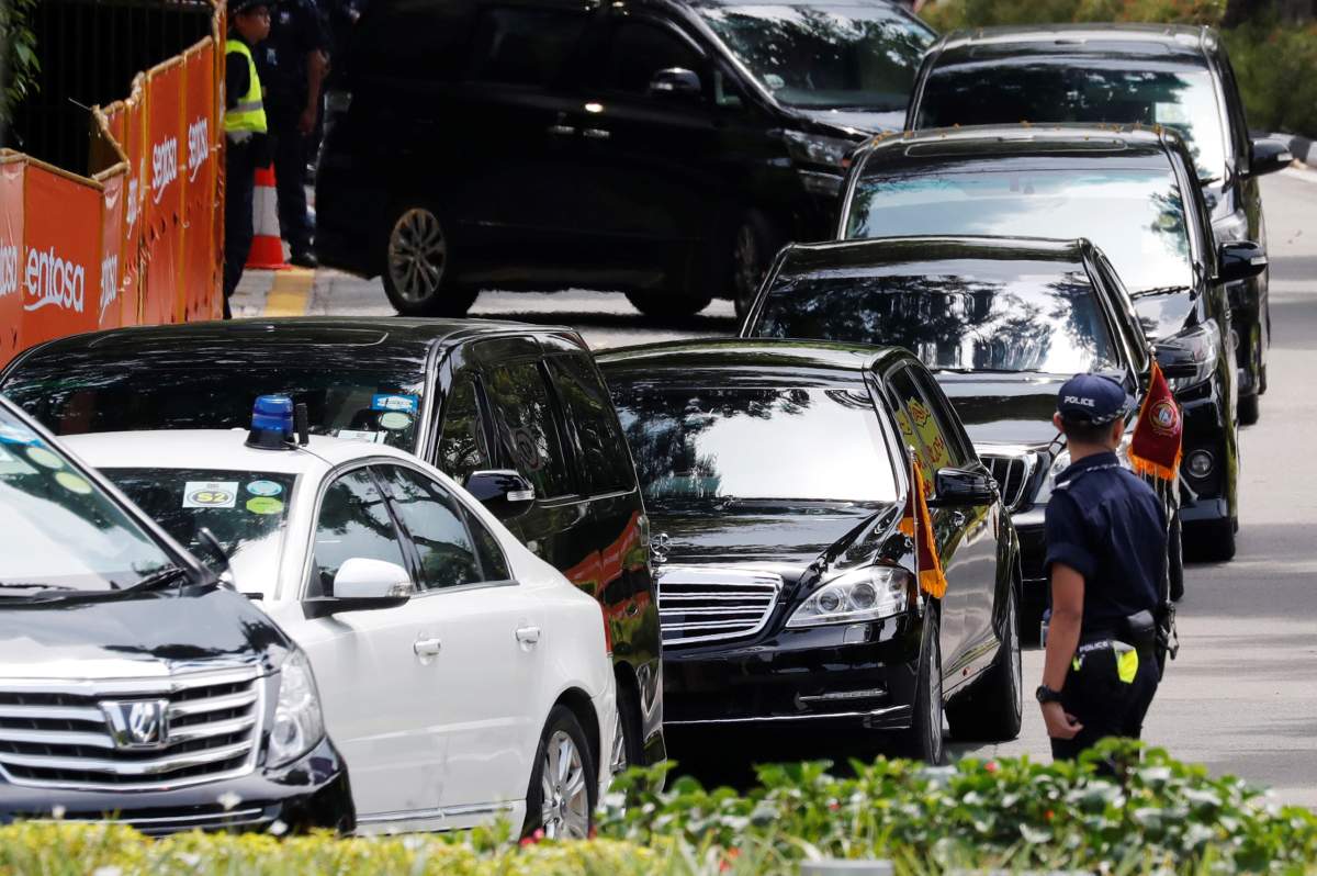 The motorcade of North Korea’s leader Kim Jong Un departs the Capella hotel on Sentosa island in Singapore June 12, 2018.