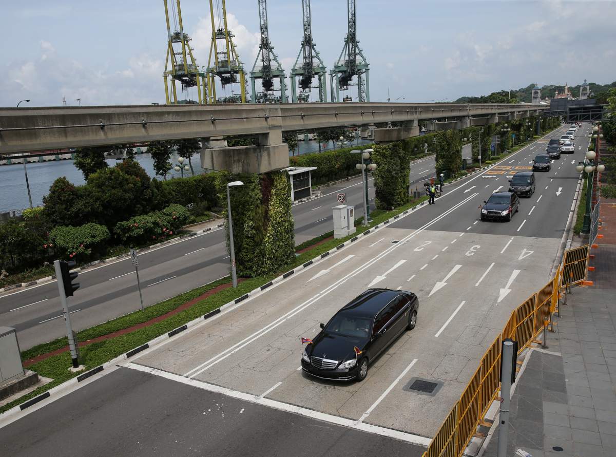 The motorcade of North Korean leader Kim Jong Un leaves Sentosa island following his summit with U.S. President Donald Trump, in Singapore June 12, 2018.