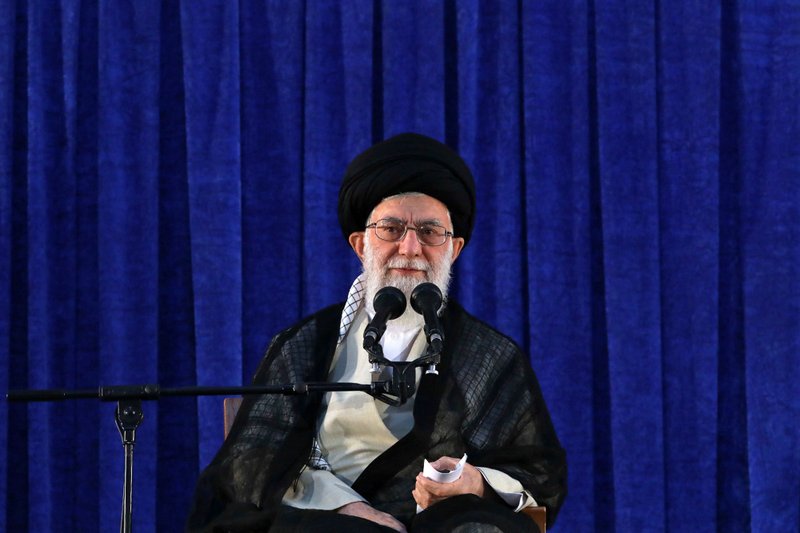 In this picture released by an official website of the office of the Iranian supreme leader, Supreme Leader Ayatollah Ali Khamenei attends a ceremony marking the 29th anniversary of the death of the late revolutionary founder Ayatollah Khomeini, at his mausoleum, just outside Tehran, Iran, Monday, June 4, 2018. 