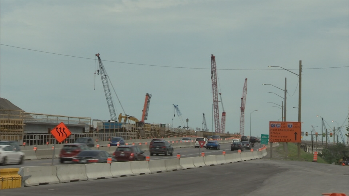 Cranes sit idle at the Champlain Bridge work site as operators walk off the job to protest new training requirements. Monday, June 18, 2018.
