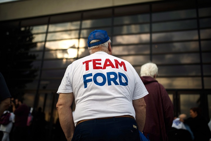 A man stands outside at the election night headquarters for Ontario PC Leader Doug Ford during the Ontario Provincial election night in Toronto, on Thursday June 7, 2018. 