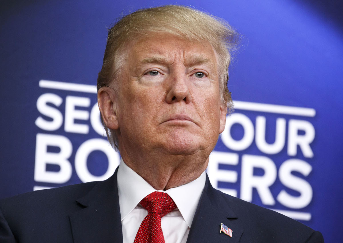 Donald Trump listens during an event with families who have lost relatives to crimes caused by illegal immigrants at the Eisenhower Executive Office Building in Washington, D.C., U.S. on Friday, June 22, 2018. 