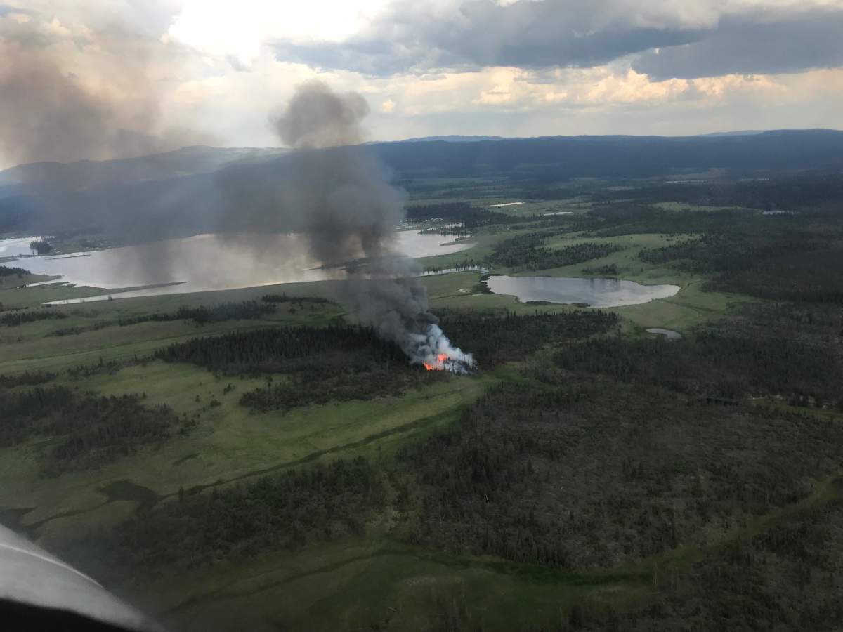 A wildfire burning between Logan Lake and Kamloops.