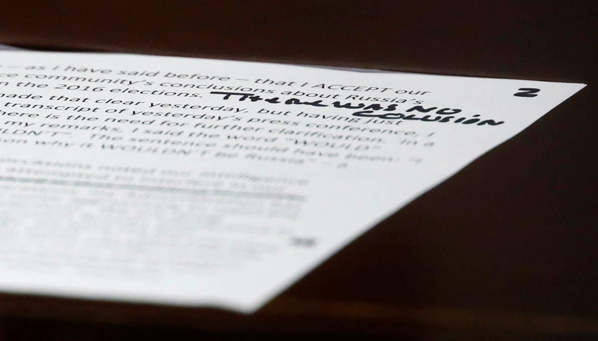 U.S. President Donald Trump’s prepared remarks show his own handwritten note “There was no collusion” at the top as he speaks about his summit meeting with Russian President Vladimir Putin at the start of a meeting with members of the U.S. Congress at the White House in Washington, July 17, 2018.