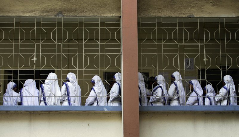 ×
None
FILE- In this April 27, 2011 file photo, nuns of Missionaries of Charity, the order founded by Mother Teresa, stand in a queue to cast their vote during West Bengal state assembly elections in Kolkata, India. Police in eastern India say they have arrested a nun and another worker at a shelter run by Mother Teresa’s charity for allegedly selling a baby. 