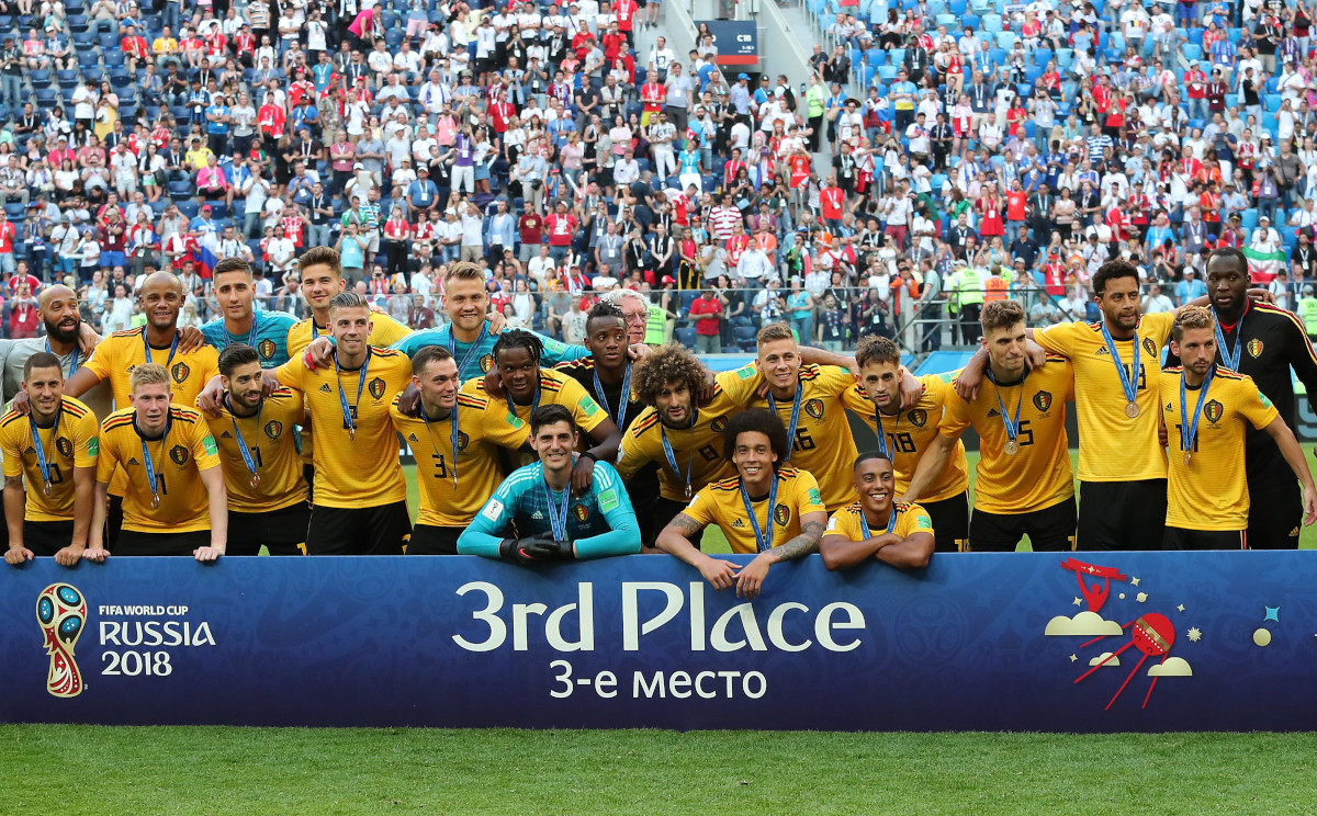 Belgium players react after winning the FIFA World Cup 2018 third place soccer match between Belgium and England in St.Petersburg, Russia.