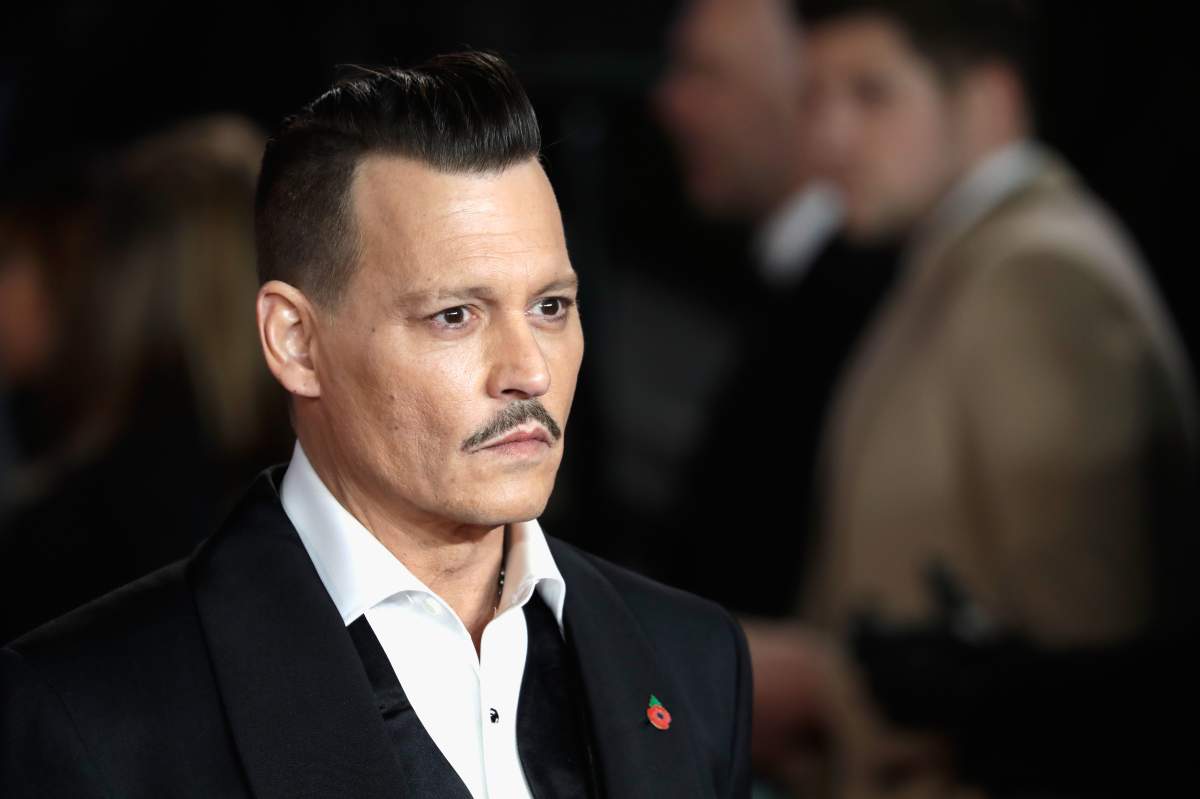  Johnny Depp attends the 'Murder On The Orient Express' World Premiere at Royal Albert Hall on November 2, 2017 in London, England.