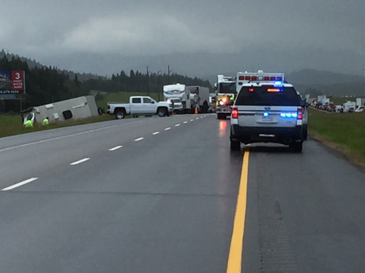 Police investigate a collision on Highway 1 west of Calgary on July 2, 2018.