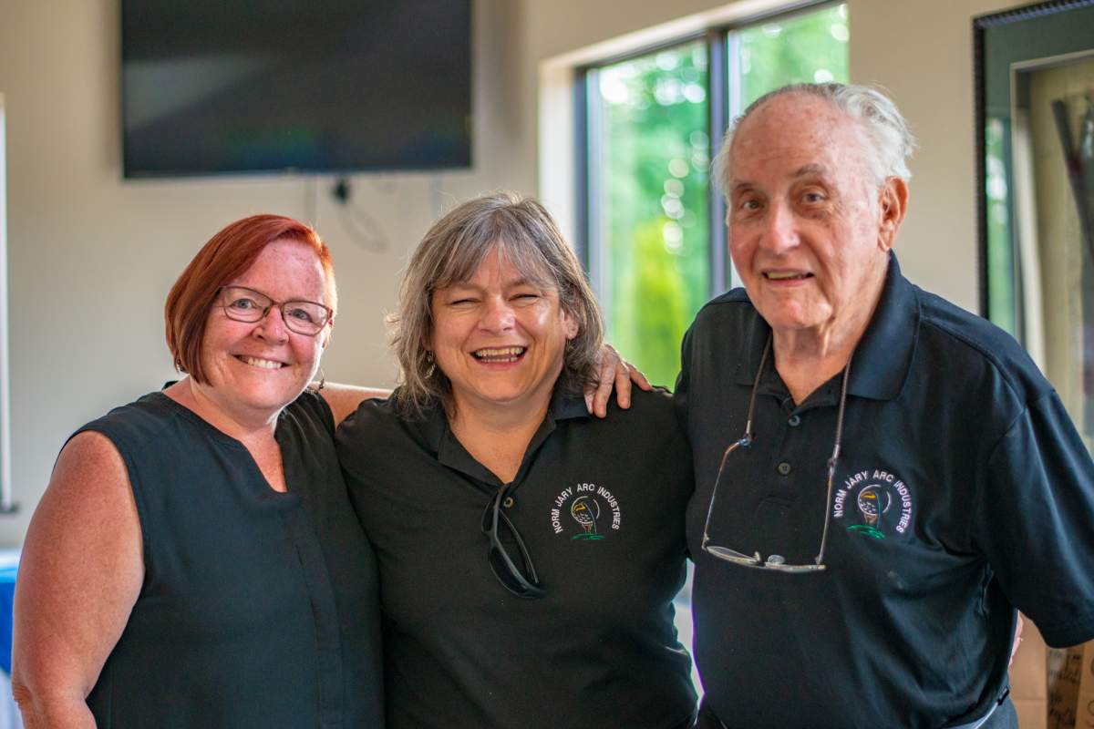 Community Living Guelph Wellington Executive Director Laura Hanley, event organizer Chris Clark, and former Mayor and event organizer Norm Jary.